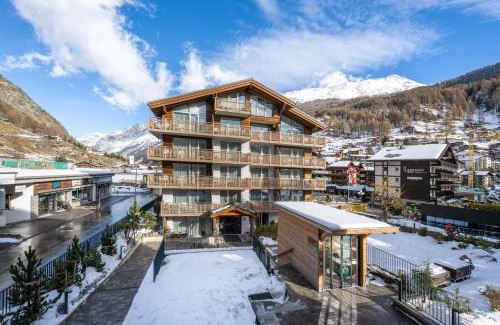 Zermatt Hotel | Experience Naco Aparthotel: Oceanfront & Spa Retreat Awaits