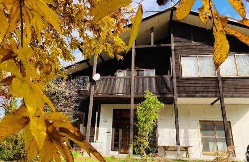 Nozawaonsen Villa | Discover Nakao Villa: Eco-Friendly Retreat with Hot Tub