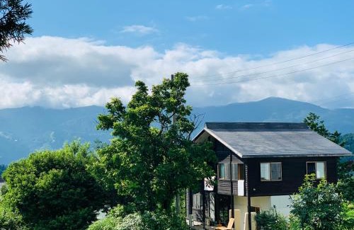 Nozawaonsen Villa | Discover Nakao Villa: Eco-Friendly Retreat with Hot Tub
