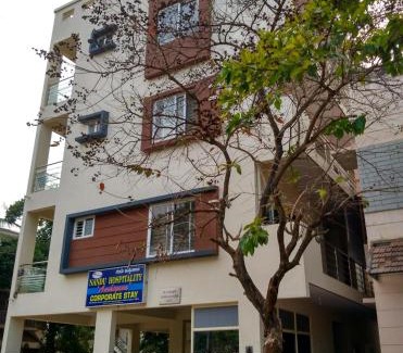 Vyalikaval HBCS Layout Apartment | Budget-Friendly Nandu Hospitality Apartments - Aashiyana