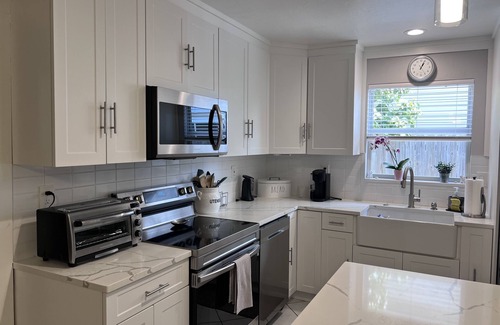 Naples Park House | Naples Park Retreat: Pet-Friendly 4BR Steps from the Beach
