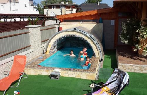 Siofok Aranypart House | Experience Napsugár Resort: Oceanfront Haven with Pool