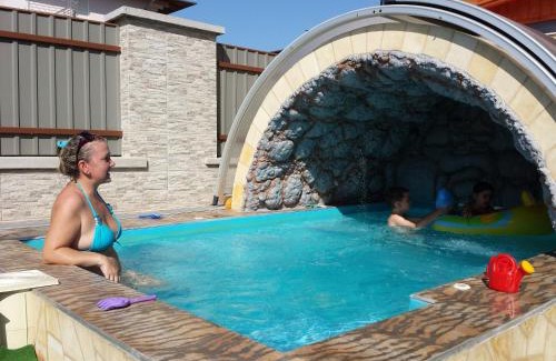 Siofok Aranypart House | Experience Napsugár Resort: Oceanfront Haven with Pool