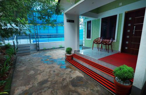 Perintalmanna House | Cozy Narmada Pool Villa with Oceanfront Views