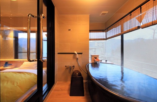Nakayamadaira Onsen Hotel | Relax at Naruko Fuga: Family-Friendly with Hot Tub Access