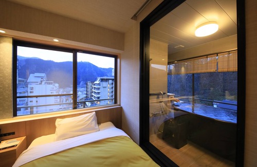 Nakayamadaira Onsen Hotel | Relax at Naruko Fuga: Family-Friendly with Hot Tub Access