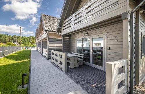 Jantar House | Discover Natura Jantar: Oceanfront Wooden Houses Await
