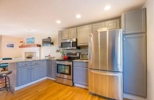 Mashpee House | Inviting Coastal Retreat at Johns Pond with Pool & Ocean View