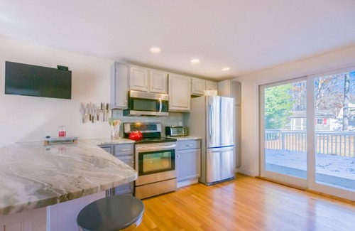 Mashpee House | Inviting Coastal Retreat at Johns Pond with Pool & Ocean View