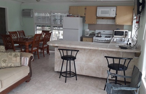 Andros Town Cottage | Beachfront Escape for Nature Enthusiasts with Spa & More