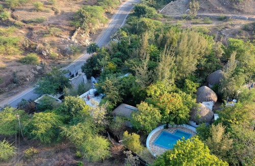 Udaipur District Cottage | Discover Comfort at Tribal Cottages Udaipur with Pool & Breakfast