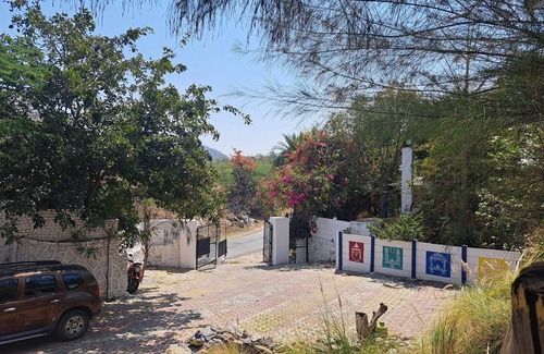 Udaipur District Cottage | Discover Comfort at Tribal Cottages Udaipur with Pool & Breakfast