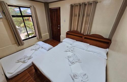 Moalboal Bed & Breakfast | Seaview Escape with Private Beach and Hot Tub Amenities