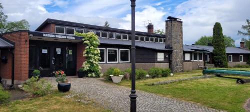 Orkelljunga Municipality Hotel | Experience Nature Shelter Hotel: Pet-Friendly & Pool Access
