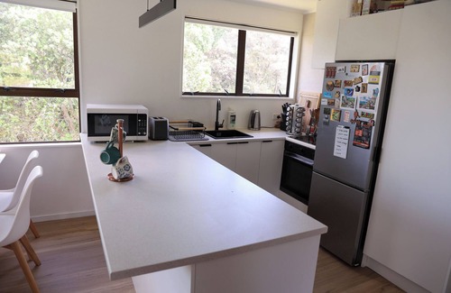 Massey House | Nature stay in Auckland with lush green in the back, peaceful.