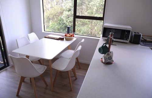 Massey House | Nature stay in Auckland with lush green in the back, peaceful.