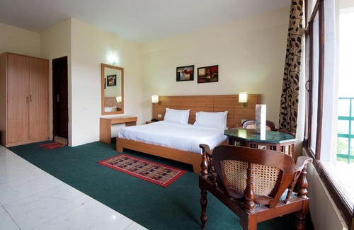 Kandaghat Resort | Inviting NatureRaga Fernhill Resort in Chail with Amenities