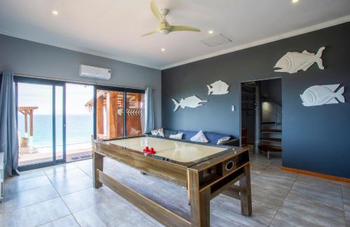 Zitundo House | Naudicals Dune: Oceanfront Family Retreat with Pool Access