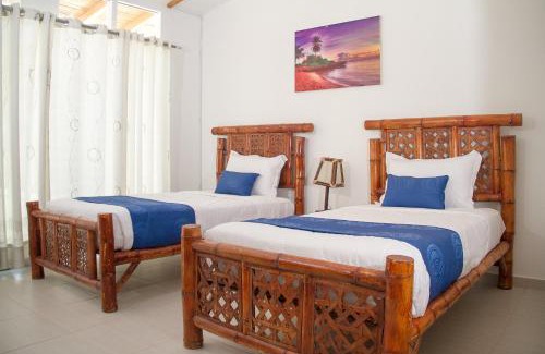 Caleta Cruz Hotel | Relax at Nauti-k Beach Hotel with Oceanfront Views