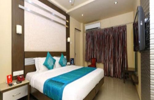 RS Puram Hotel | Experience Comfort at NavaRATNA Delight - Pet Friendly & Spa