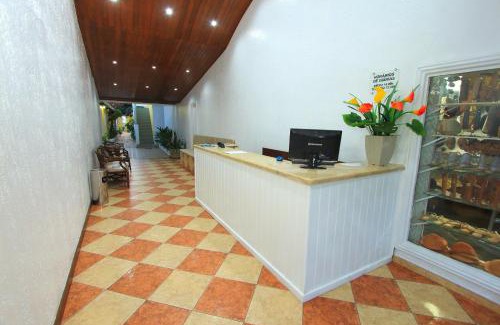 Puerto Seguro Center Hotel | Welcoming Navegantes Hotel: Pool, Breakfast & Family-Friendly