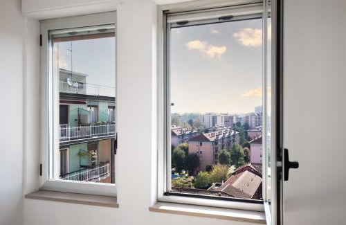 Stadera Apartment | Experience Vibrant Navigli with Skyline Views and Family Amenities