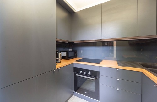 Porta Genova Apartment | Stylish Loft in Navigli with Breakfast & Family Amenities