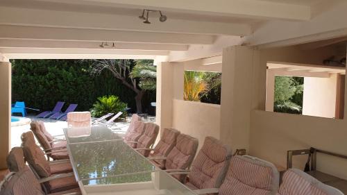 Les Tres Cales Villa | Beachfront Oasis with Pool, Hot Tub & 8 Bedrooms for Groups