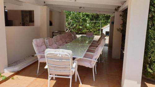 Les Tres Cales Villa | Beachfront Oasis with Pool, Hot Tub & 8 Bedrooms for Groups
