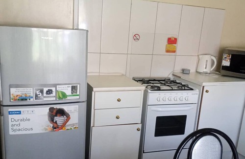 Harare Apartment | Cozy Cottage Retreat with Pool and Breakfast Awaits You