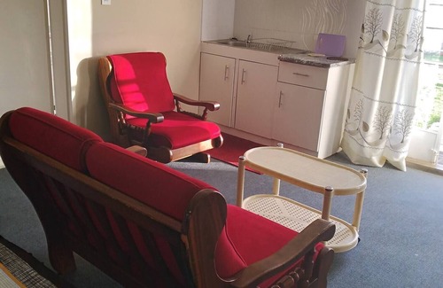 Harare Apartment | Cozy Guest Suite with Office Corner for Family Getaways