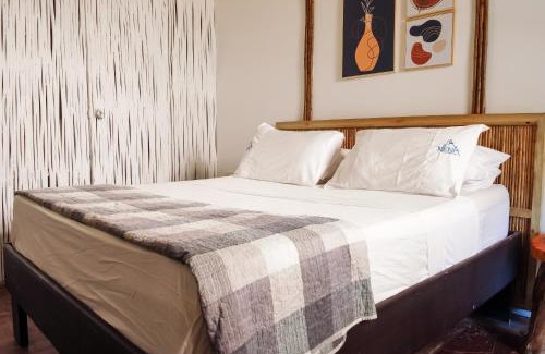 Cartagena District Hotel | Relax at NENA BEACH CLUB & HOTEL with Oceanfront Views