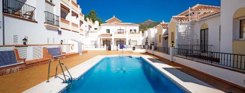 Chimenea Apartment | Charming Nerja Paradise Rentals with Pool & Pet-Friendly
