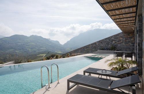 Agios Vasileios Villa | Elegant Cave-Style Villa Complex with Mountain Views