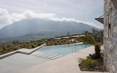 Agios Vasileios Villa | Elegant Cave-Style Villa Complex with Mountain Views