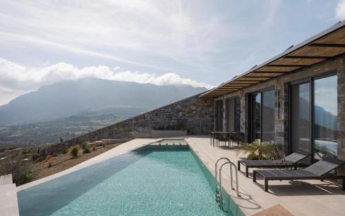 Agios Vasileios Villa | Elegant Cave-Style Villa Complex with Mountain Views