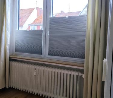 Sudervorstadt House | Cozy Bedroom with Shared Bathroom in Central Location