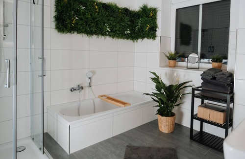 Sudenburg Condo | Discover AUR Design: Modern Boho Escape with Spa & Terrace