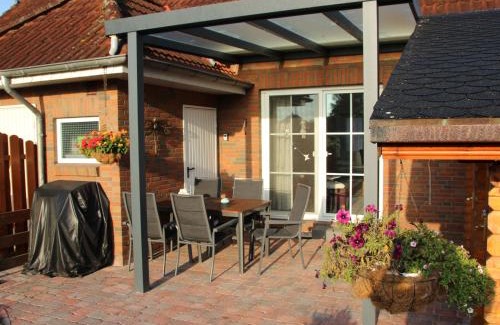 Timmel House | Discover Ferienhaus Conny: Pet-Friendly Retreat with Boat