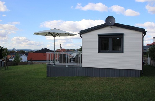 Wiesenbronn Apartment | Charming Mobile Home with Terrace and Ocean View