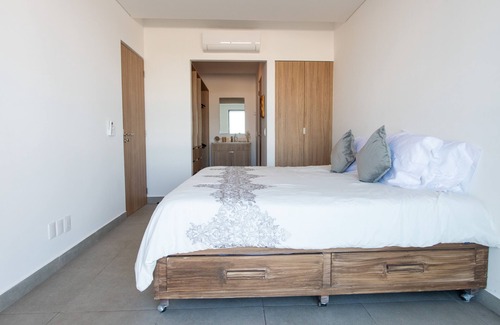 Zona Industrial Condo | Modern 2BR Condo Near US Consulate with Great Amenities