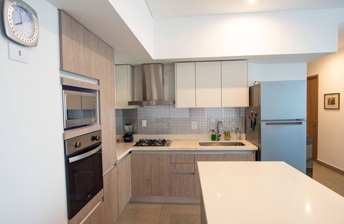Zona Industrial Condo | Modern 2BR Condo Near US Consulate with Great Amenities