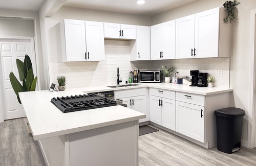 Lancaster House | Premier 3 BR Retreat with Spa, Hot Tub & Gated Parking