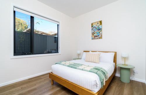 Ainslie House | Modern 4-Bedroom City Home with Tesla Charger Awaits You