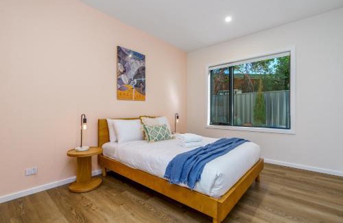 Ainslie House | Modern 4-Bedroom City Home with Tesla Charger Awaits You
