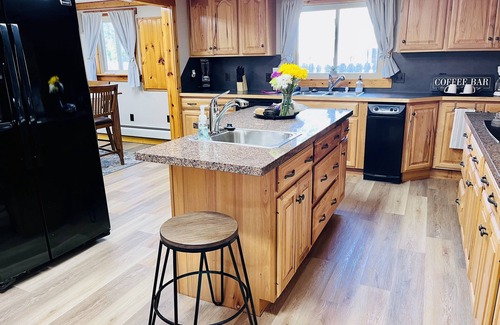 Bay City House | New Lodge Retreat: 4BR with Private Dock & Scenic Views