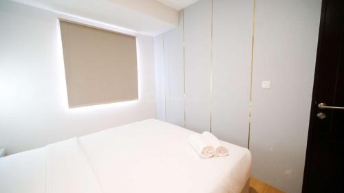 Sidoarjo Apartment | Cozy 2BR Apartment at Suncity Residence for Your Getaway