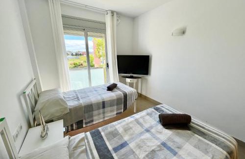 Sant Antoni de Calonge Apartment | Family-Friendly Apartment with Pools, Steps from the Beach