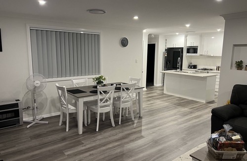 South Windsor Apartment | Private First Story Apartment with Pool and Family-Friendly Perks