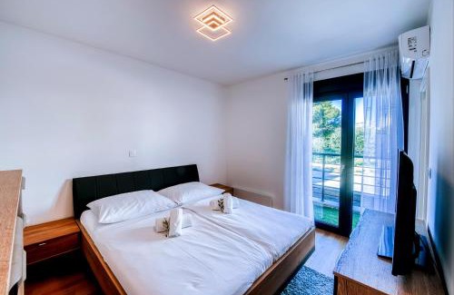 Povljana Apartment | Relax at Budinski: Oceanfront Apartment with Pool Access